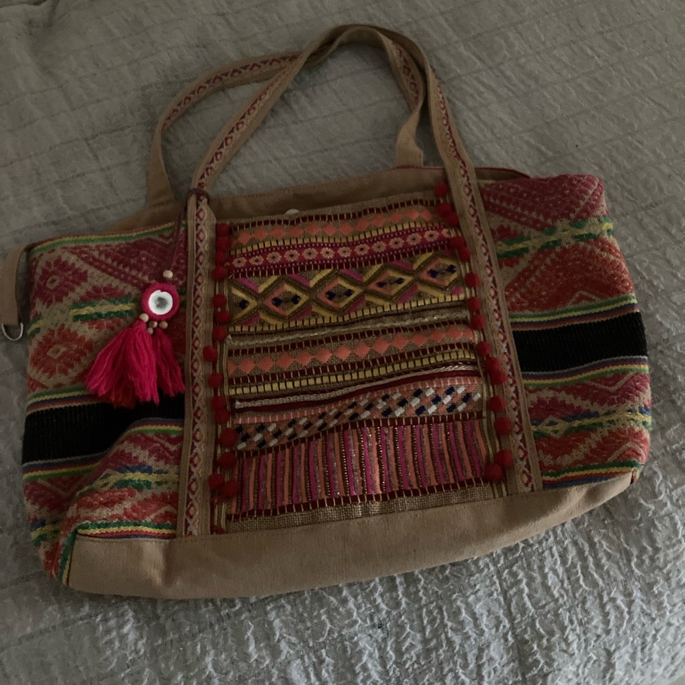 America and beyond tote bag